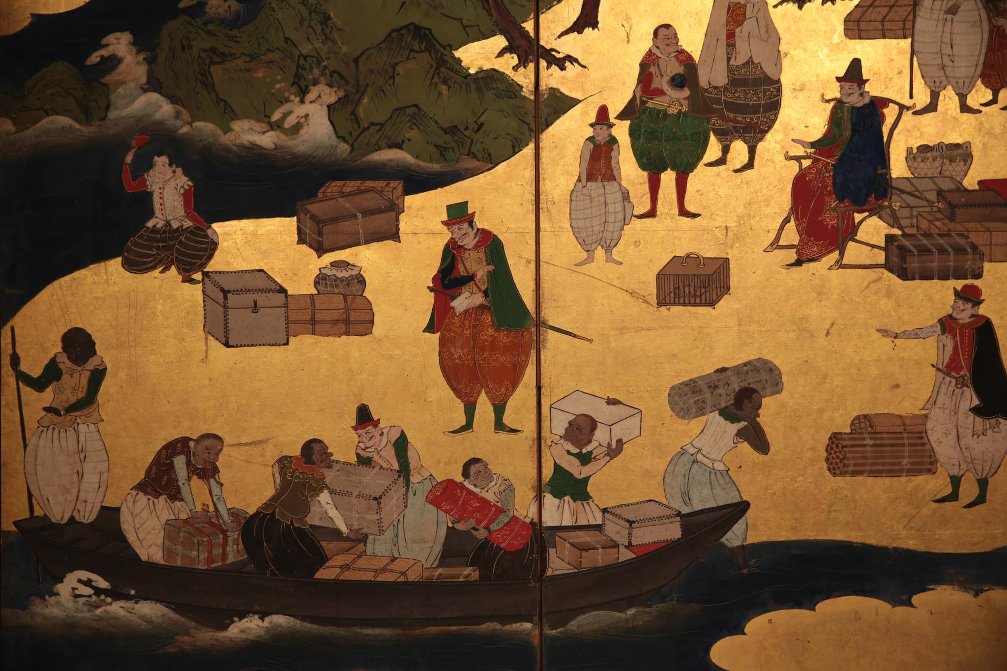 People unloading traded items, painted on a Namban folding screen (Namban Bunkakan Collection)